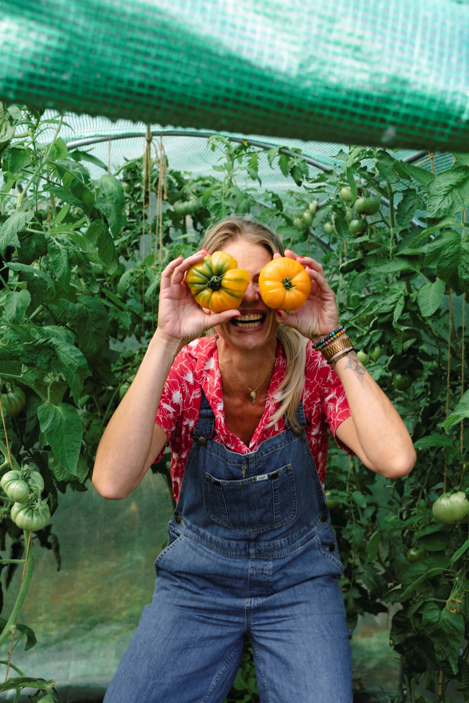 woman and tomatoes